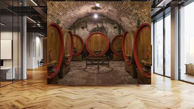 Wine barrels (botti) in a Montepulciano cellar, Tuscany Wall mural