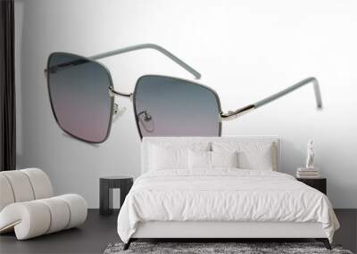 Elegant sunglasses with square frames and gradient lenses on a white background, ideal to enhance any outfit with a touch of elegance. Wall mural