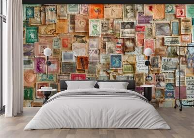 Antique postage stamps arranged in various colors on a vintage backdrop evoking nostalgia Wall mural