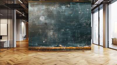 Chalkboard wall background with visible smudges and faint drawings softly lit Wall mural