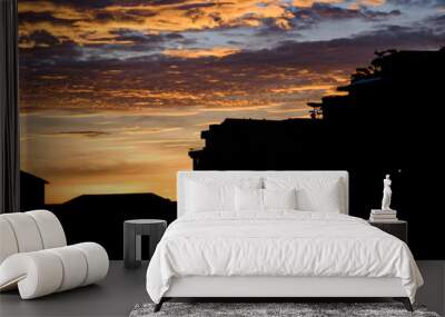 Dawn in the city. City with beach. Dawn at sea. A new day. Early morning. Wall mural