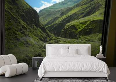 River in the middle of two mountains. Wall mural