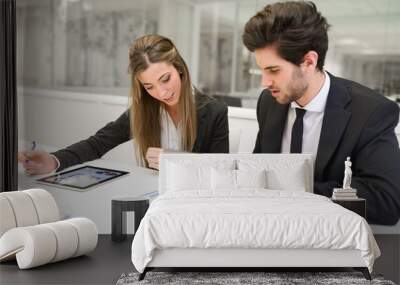 Business people working around table in modern office Wall mural