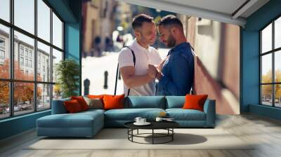 Gay couple in a romantic moment outdoors Wall mural