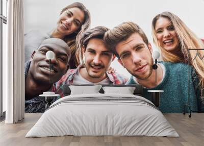 Group of friends having fun together outdoors Wall mural