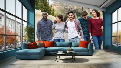 Group of friends having fun together outdoors Wall mural