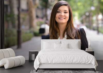 Japanese business woman in urban background Wall mural