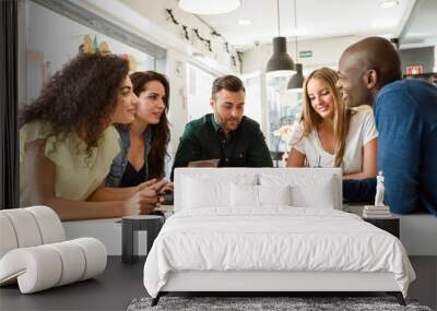 multi-ethnic group of young people studying together on white desk Wall mural