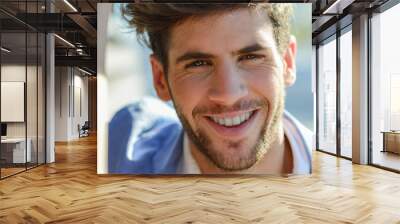 Portrait of attractive guy smiling Wall mural