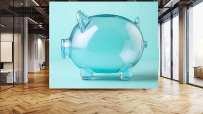 Glass piggy bank on a pastel blue background for financial savings concepts. Wall mural