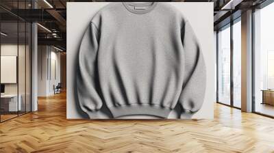 A heather gray crew neck sweatshirt with ribbed cuffs and waistband on a white background. Wall mural