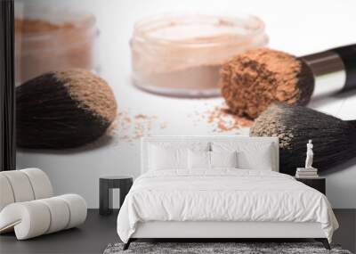 Crushed compact and loose powder with makeup brushes Wall mural