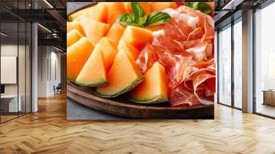 A delectable plate of fresh melon slices paired with savory cured meat, perfect for summer gatherings and gourmet appetizers. Wall mural