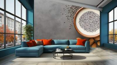 Bowl of chia seeds soaking in almond milk, brain-boosting breakfast preparation, healthy and nutrient-dense Wall mural