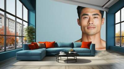 Close-up of an Asian man with even, blemish-free skin, natural light enhancing his healthy, clear complexion, blemish-free skin, healthy complexion, natural beauty Wall mural