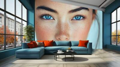 close-up of a asian american woman with beautiful blue eyes and a beautiful natural eyebrow Wall mural