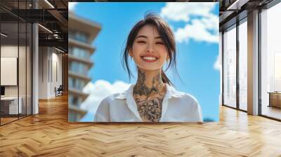 Photo low angle of cheerful cute adorable asian american girl with tatoos cheerful smile wear white shirt enjoying free time sunny weather outdoors modern city Wall mural