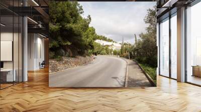 empty road on a hill side in spain Wall mural