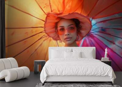 Stylish woman in vibrant summer fashion with a colorful umbrella Wall mural