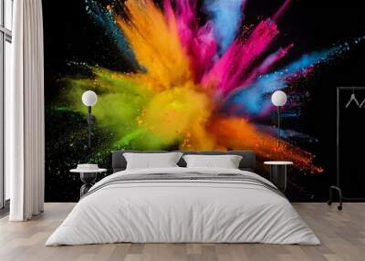 explosion of colorful holi powder on black background vibrant color dust particles textured background Wall mural