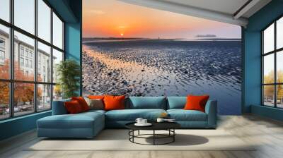 Overview of beautiful Silver Sands Beach at sunrise at low tide at Silver Sands State Park , Milford Connecticut, USA. Photo shows Charles Island in the background. Wall mural