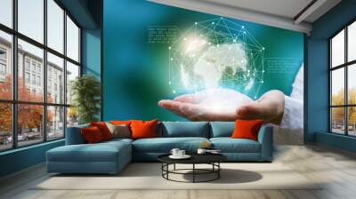 Businessman holding in hand with global connection concept. Wall mural