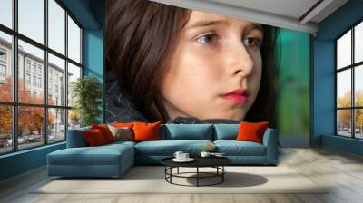 Young Girl With Chin On Wrist Looking Sad Wall mural