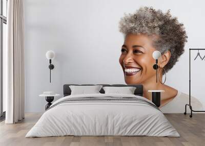 Beautiful black woman with smooth healthy facial skin. Beautiful aged mature woman with short gray hair and happy smile. Beauty and skin care cosmetics advertising concept. Wall mural