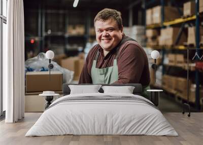 Cheerful young man with down syndrome working in a warehouse, social inclusion concept. Generative AI Wall mural