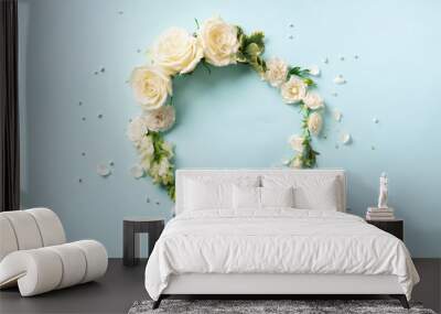 Flowers composition. Wreath made of white roses and rose petals on blue background. Flat lay, top view. Banner with copy space Wall mural