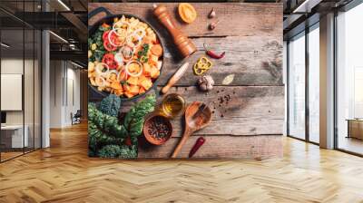 Ingredients for cooking on wooden table. Vegan diet concept with copyspace. Organic vegetarian ingredients and kitchen tools. Healthy, clean food and eating concept. Zero waste Wall mural