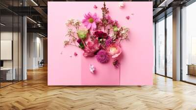 Pink envelope with spring flowers. Floral composition, creative layout. Flat lay, top view. Spring, summer or garden concept. Present for Woman day. Square crop Wall mural