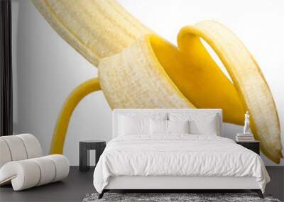 Closeup of peeled ripe banana isolated. Wall mural