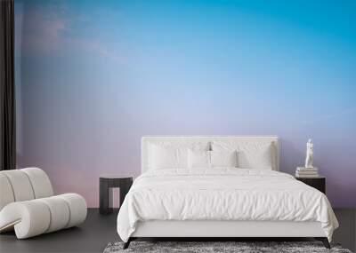 Sunset dramatic blue sky pink clouds background Wall mural