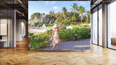 blonde woman in tulum ruin in mexico Wall mural