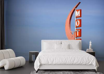 aged and worn vintage neon motel sign with arrow Wall mural