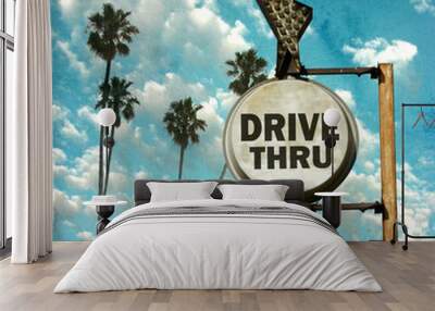 aged and worn vintage photo of drive thru sign with palm trees Wall mural