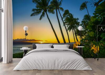 Sunset in Hawaii with yellow flowers Wall mural