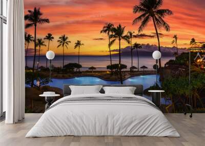 Tropical resort with sunset near beach Wall mural