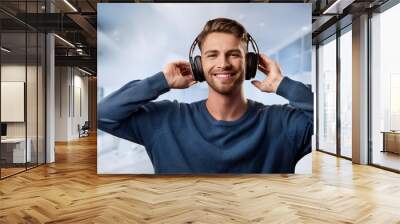 Happy adult portrait young sound men handsome person male caucasian music smile listen Wall mural