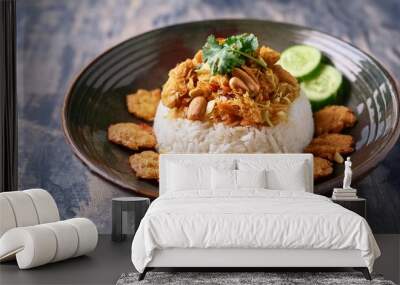 Savory chicken rice with a crispy topping of fried coconut and vegetables, served with crunchy peanut crackers. Indulge in this Indonesian comfort dish. Wall mural