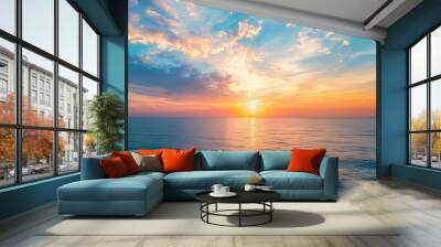 Stunning ocean sunset with vibrant colors across the sky and calm waters, creating a serene and peaceful landscape perfect for relaxation. Wall mural