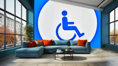 Blue symbol on wheelchair Wall mural