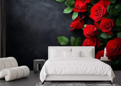 Bouquet of red roses lying on a textured black background Wall mural