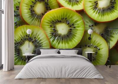 Freshly sliced kiwi fruit with vibrant green flesh and seeds in detail Wall mural