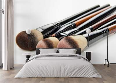 Professional makeup brushes lying on white surface Wall mural