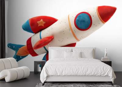 Colorful plush rocket toy isolated on white background. Perfect for kids' playtime or nursery decor, featuring star details and soft fabric. Wall mural