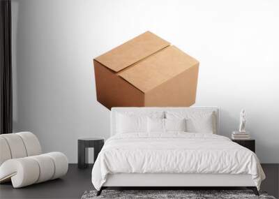 Minimalistic image of a closed, brown cardboard box isolated on a white background, ideal for packaging and shipping concepts. Wall mural