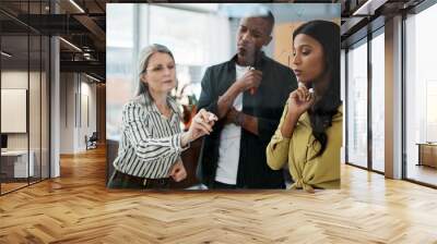 Benefit of the doubt Ill earn my stars. Shot of a group of businesspeople brainstorming in a modern office. Wall mural