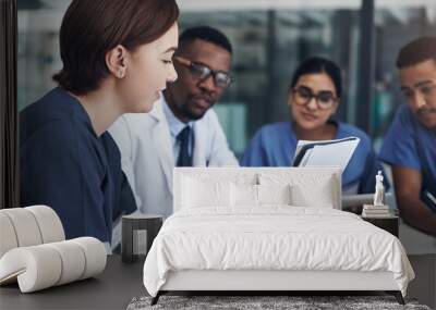 Implement those changes and we can see. Shot of a group of nurses and doctors having a meeting together. Wall mural